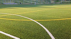 スポーツグラウンドに人工芝を活用したイメージ